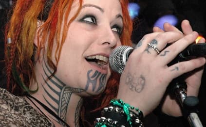 Holly Brewer of Humanwine still remains the only chick I have ever seen able to pull off a neck/facial tattoo. Props.