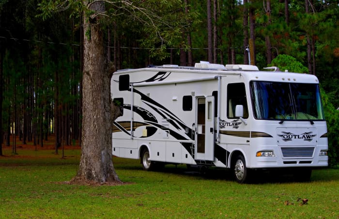 Is placing a motorhome, trailer or camper on your own land legal or even a good idea? Find the answers here.