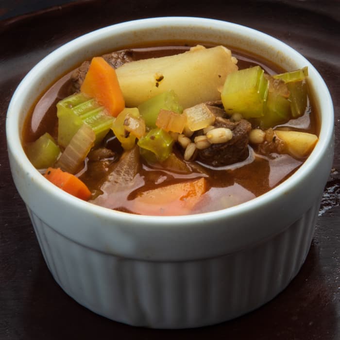 Beef and veggie soup is just one of many set-it-and-forget-it meals you can make in your crock pot while you're on the road.