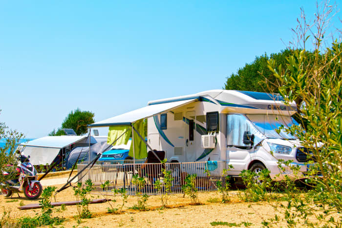 This article is a detailed overview of what you can expect if you decide you want to live in a campground in your RV.