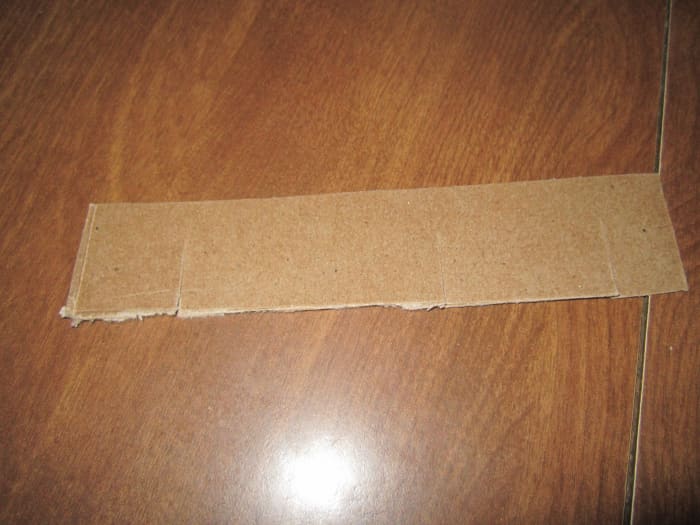 Cut slits halfway up the slips. Varying the distance the slits are cut will change the size of the compartment. Refer to your sketches for help or freestyle--but make sure all the cuts are the same on the slips going in the same direction.