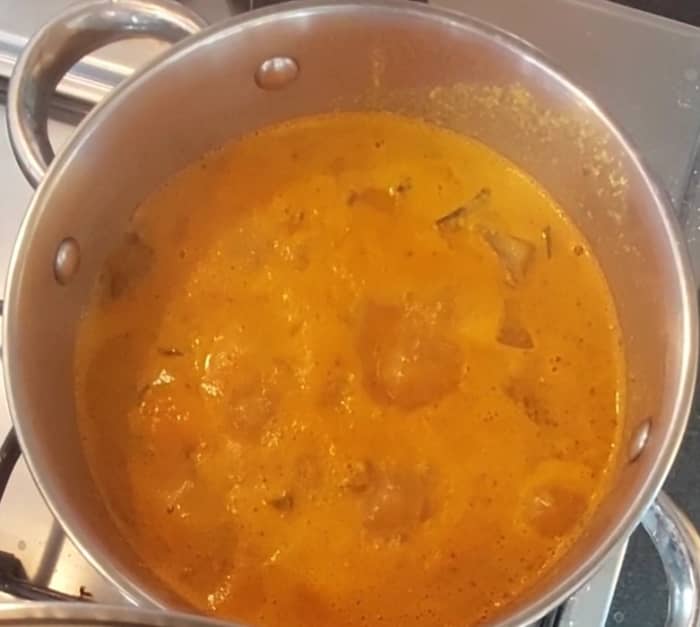 Mix to combine the masala with the vegetables. Add more water if required to adjust the consistency. Adjust salt. Close the lid and cook over medium flame for 5 minutes, or till raw smell of the masala and tamarind goes away. Switch off the flame.