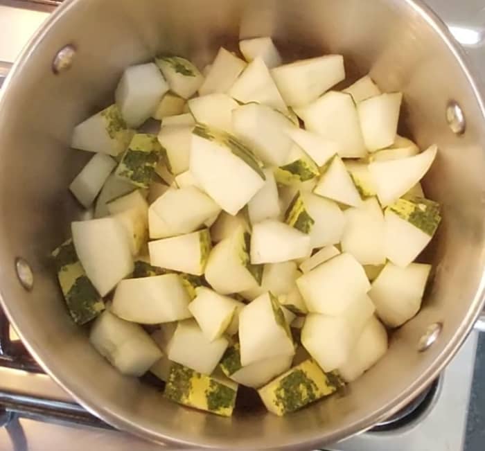 Wash and cube mangalore cucumber (no need to peel off the skin). Transfer the cubed cucumber to a vessel.
