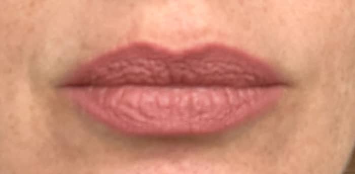 Charlotte Tilbury Matte Revolution Lipstick In Pillow Talk Swatch On The Lips in full daylight