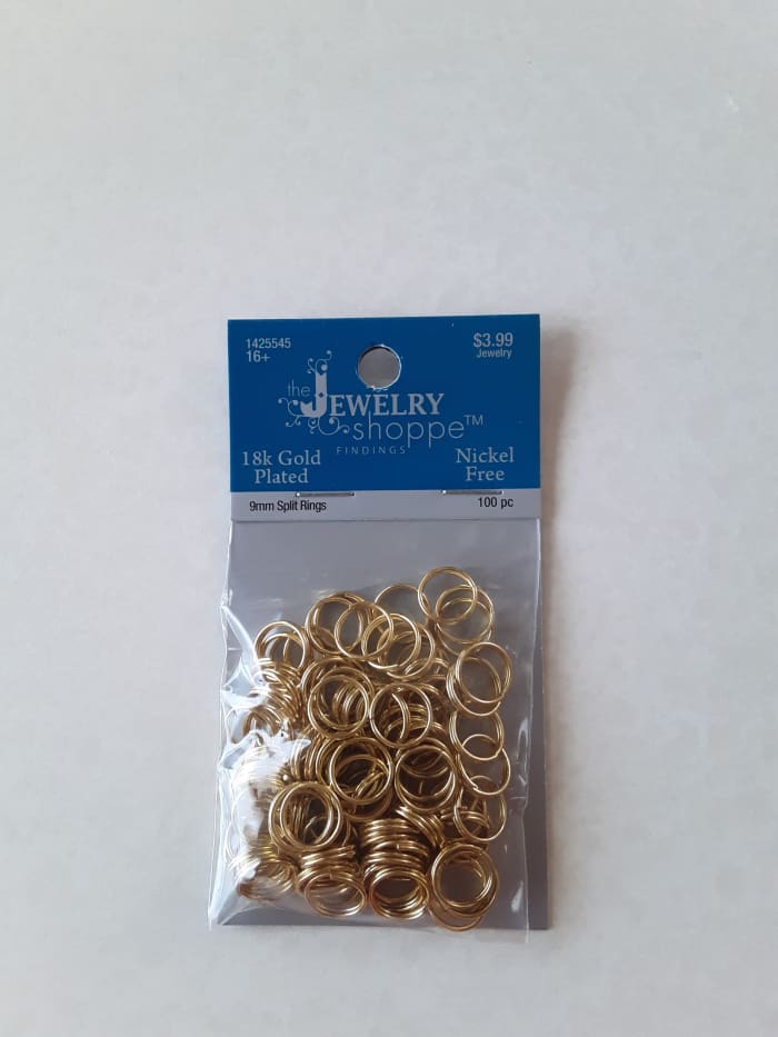 These are gold split rings. I chose gold to match the opera theme, but these rings also come in black and silver.