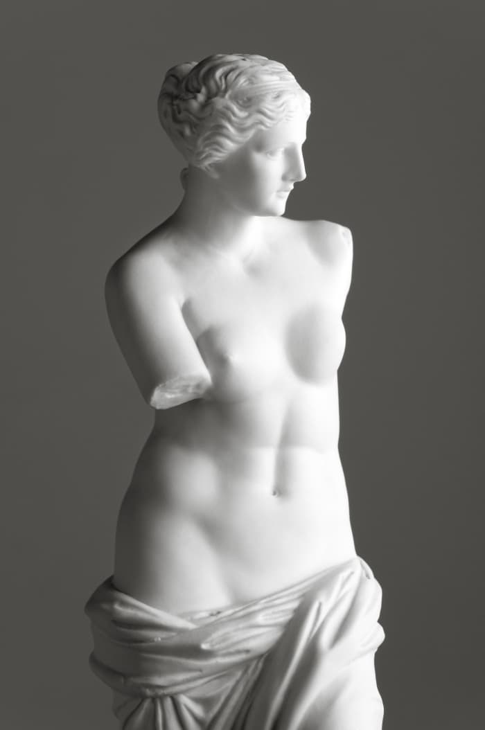 Vintage copy statue of Venus (Aphrodite) de Milo, a famous Greek sculpture dating back to about 100 BC, discovered in 1820 on the Aegean island of Milos.