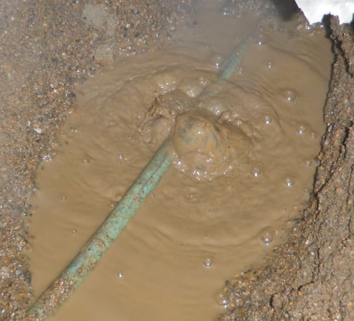 This pinhole leak on a service line into a home was found by United Leak Detection in Lafayette, Indiana.