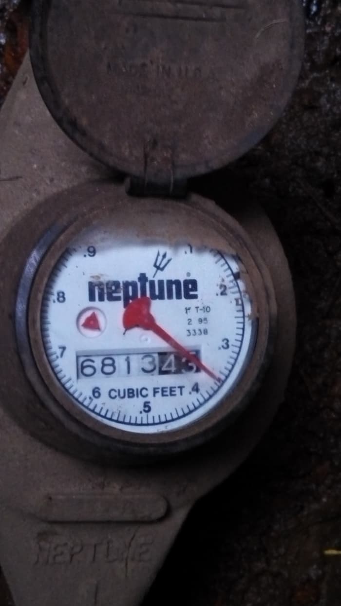 The small triangle is a leak indicator. If it is rotating at all, you may have a leak, and need to investigate further.