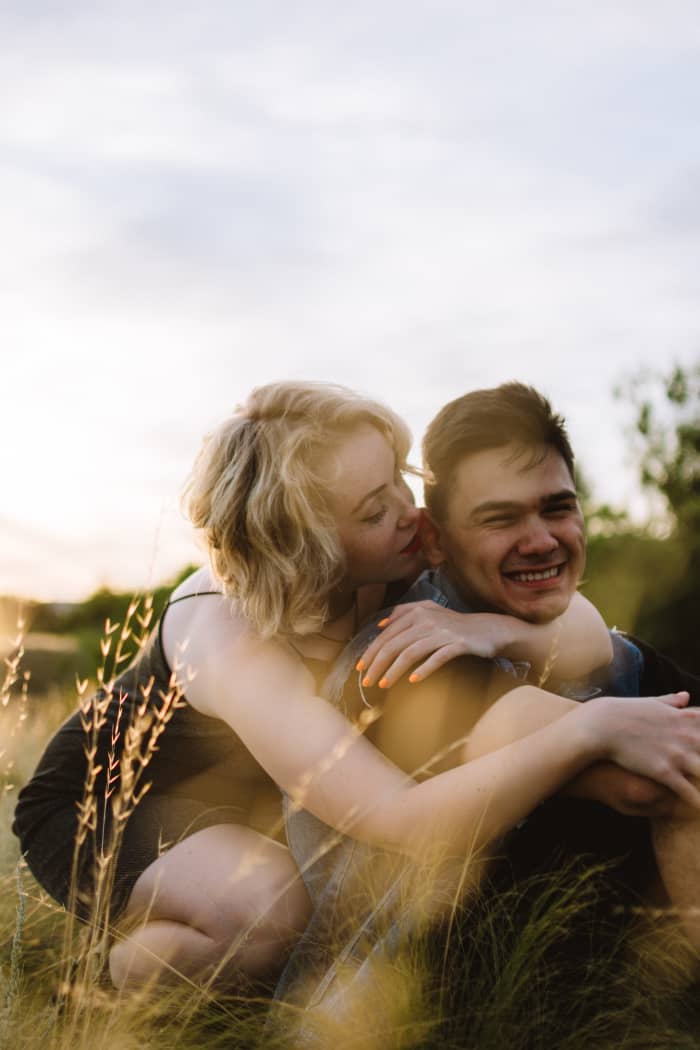Cancer can come off really shy when they like someone. They may blush, but they'll still have a smile or open body language.