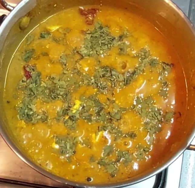 Mix gently without breaking the paneer. Cook for 1 minute. Adjust salt, add 1/2 teaspoon garam masala powder and mix well. Add 1 teaspoon kasuri methi and mix. Switch off the flame.