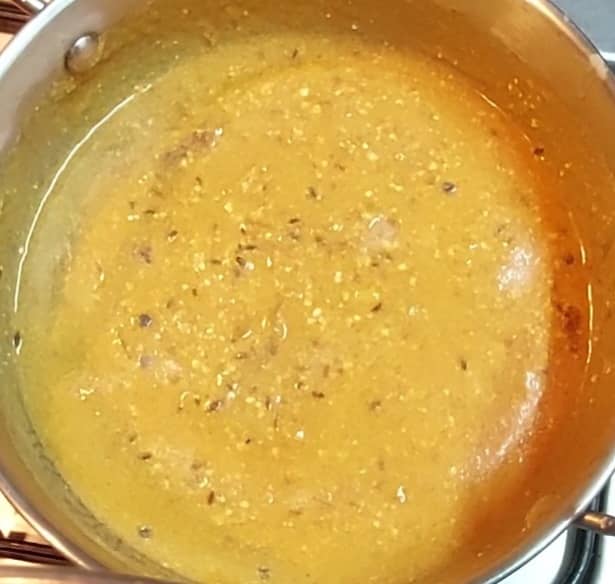 Mix well with the spices. Add 1/2 cup of water and mix. Add salt to taste. Close the lid and cook for 5 minutes.