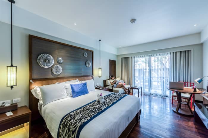 This bedroom is perfect to file under the Cancer template. The rounded art on the wall that's silver and in the shape of mollusks is about as Cancer as one can get. I love the hints of silver throughout the room. The blue pillow has aquatic vibes.