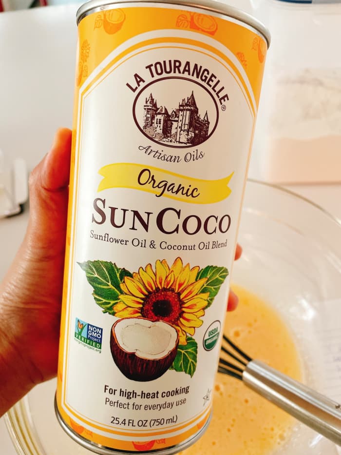 Add the oil into the mixture. I use organic sunflower and coconut oil blend, but any type of vegetable oil is fine.