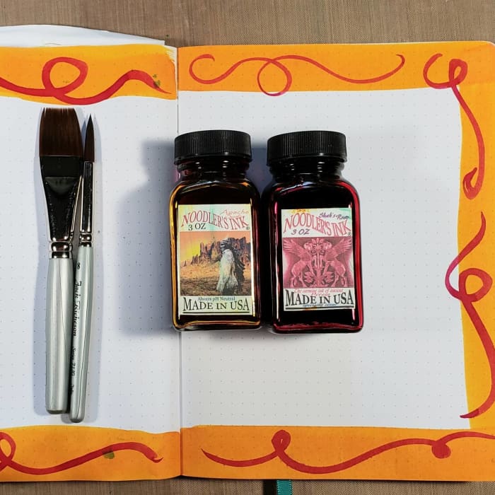 This bullet journal page was made with Noodler's Inks: Apache Gold and Shah's Rose, plus two watercolor brushes, one 1/2" flat and one #4 round.