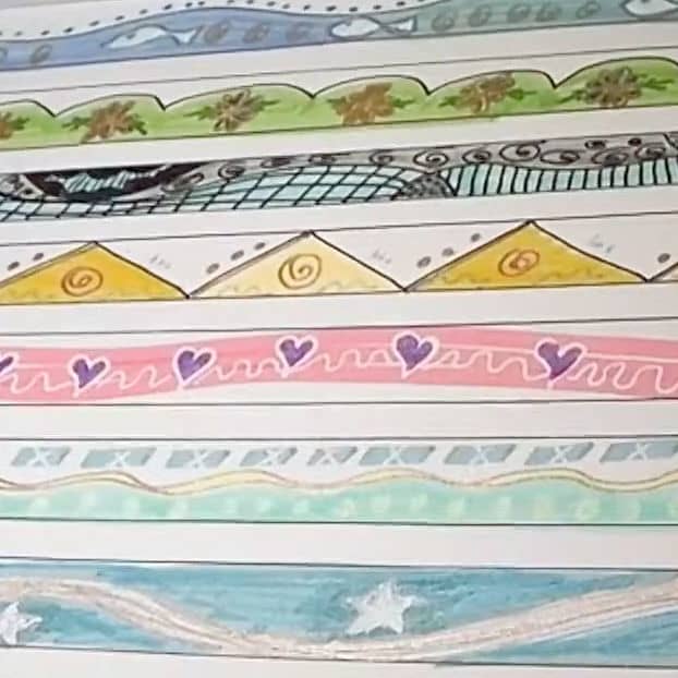 A page of bullet journal page border sample designs I made for reference in one of my art journals.