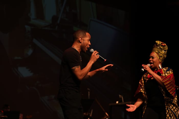 Andaiye and Eugene IV Singing African Man in Soaring High Album Release Concert. Photo Credit. Carolyn Grady.