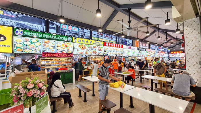A larger kopi-tiam. Ten dollars can go a long way at these local eateries. Being well-acquainted with them is also a must to visit Singapore on a budget.