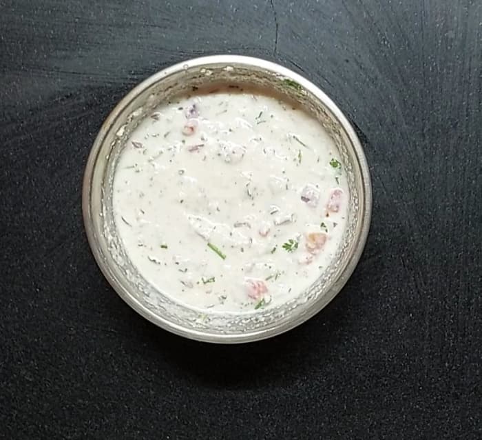 Mix well. Add 1 cup of water. and mix again to make the batter. Cover with a lid and let it rest for 20 minutes.
