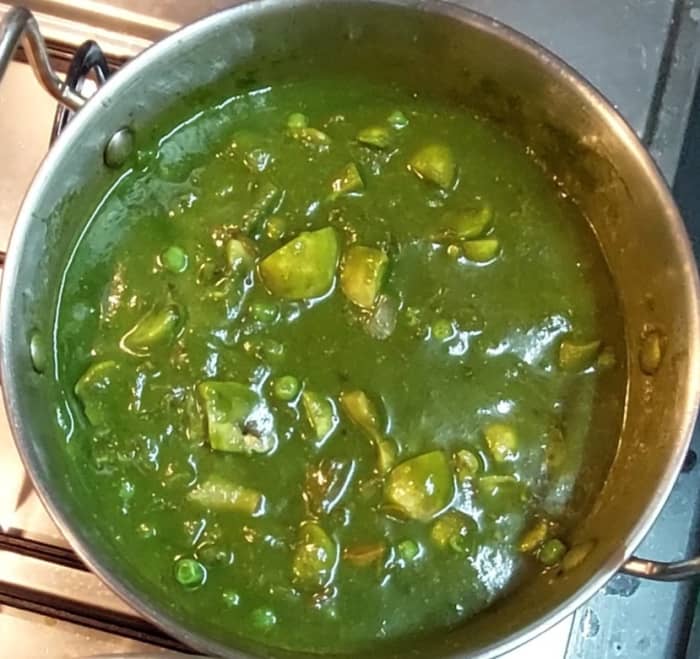 Add 1/2 cup water and mix well. Close the lid and cook over medium flame for 10 minutes or till mushrooms are well cooked.