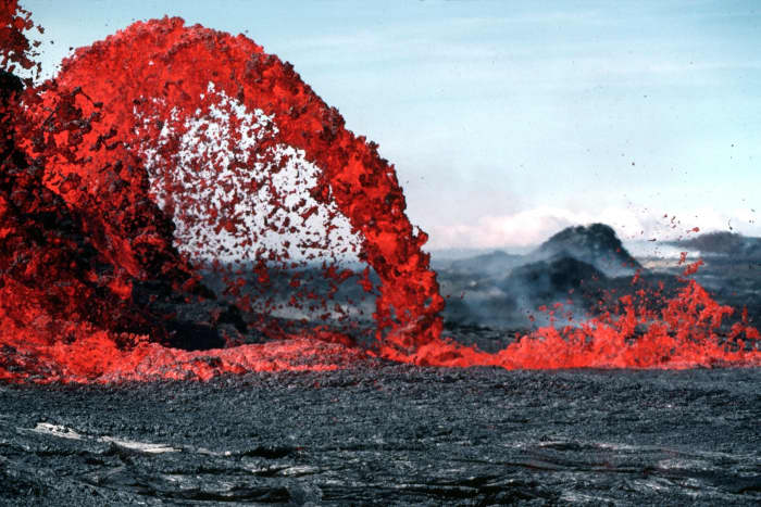 A photo of lava that is erupting, one of the key factors or qualities that symbolizes the episode Volcano Island.