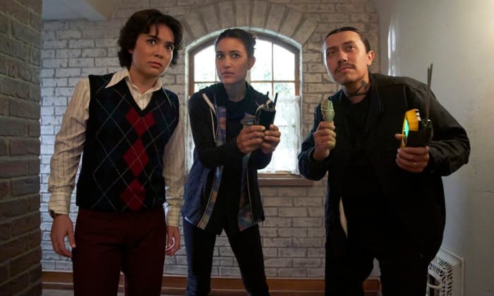 L-R: Jesse Leigh, Julia Jones, and Bobby Wilson in "White Man in the Cupboard," Season 2 Episode 1 of Rutherford Falls.
