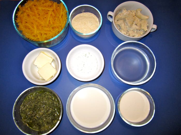 Ingredients (minus sun dried tomato crumbs): Fusilli pasta, parmesan cheese, milk, water, heavy cream, pesto sauce, alfredo dry mix, butter, and chicken.