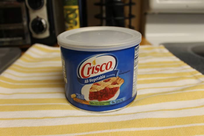 Crisco works very well as a shortening for the empanada dough. It's what I use when I make empanadas.