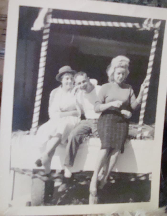 From left to right: Edie, Larry, and me. We were working on making a float for junior high.