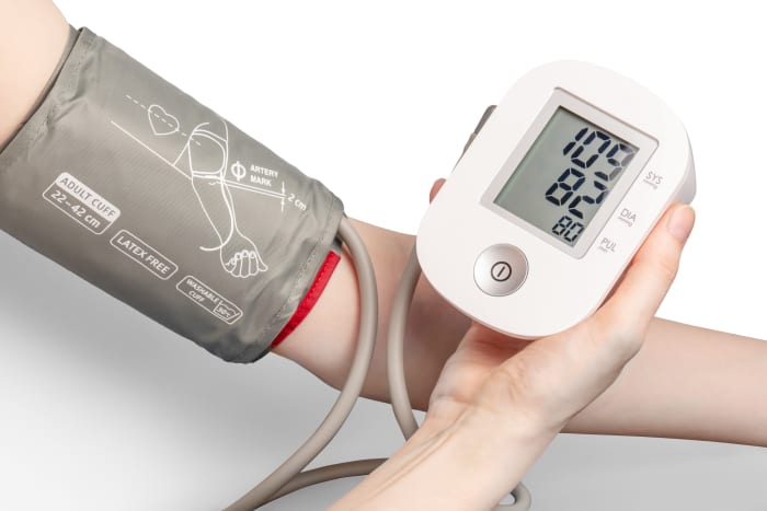 I think it's possible that migraines could be aggravated by pressure in blood vessels being higher, and there's nothing to lose by having it checked.