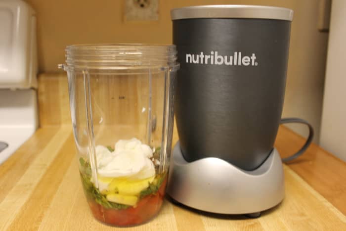 Add the olive oil, apple cider, lime juice, salt, pepper, cumin, chili powder, Greek yogurt, and sugar to the blender. If you like a creamier dip, add a little more Greek yogurt.