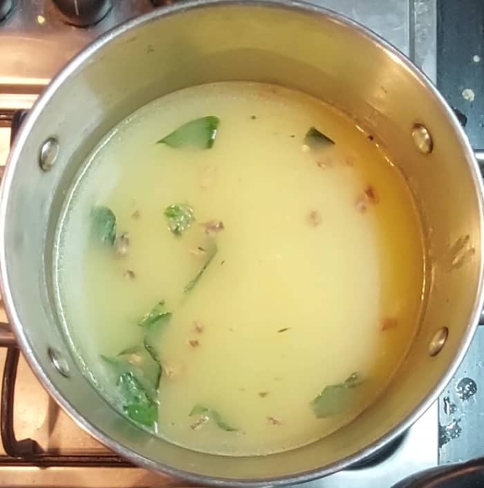 Add 2 cups of water and mix well. Add salt to taste, close the lid and let the water comes to a rolling boil.