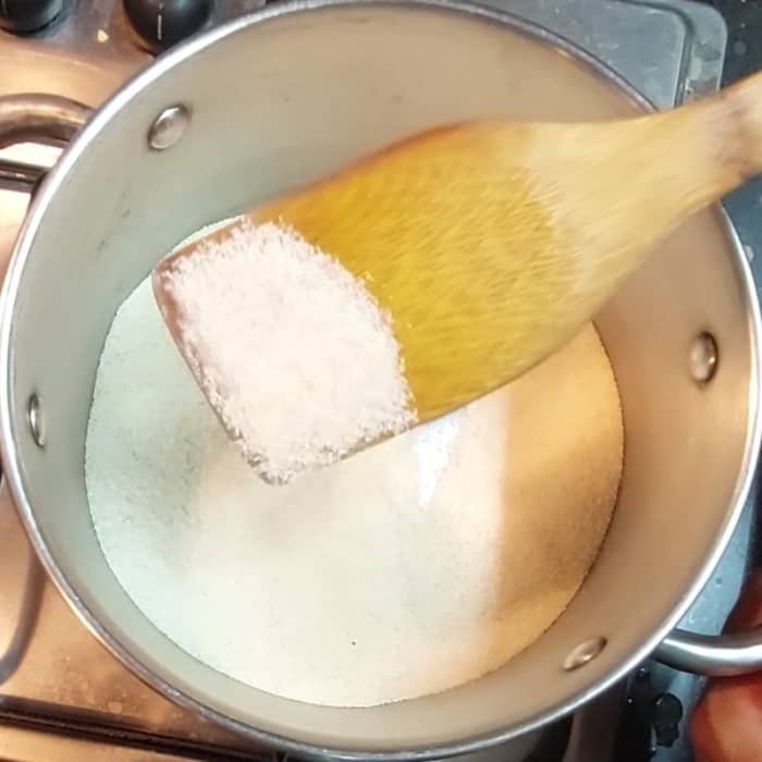 In a pan, add 1 cup of rava and 1/2 teaspoon ghee. Dry-roast the rava till color changes slightly and turns aromatic. Transfer to a plate.