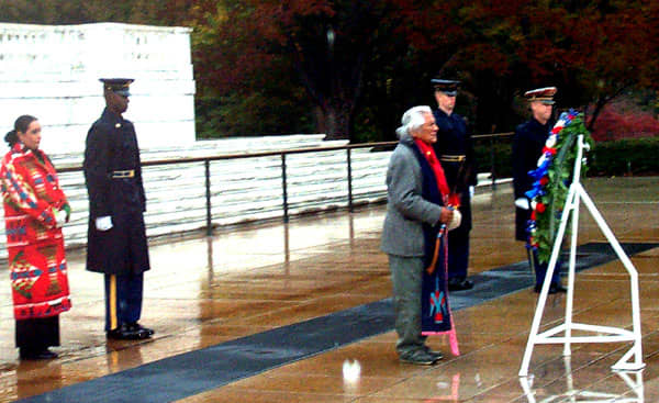 Charles Chibitty offers an Indian prayer at the Tomb of the Unknowns at Arlington National Cemetery. He visited at least times, during Native American Heritage Month in November: 1992, 1999, and 2002.