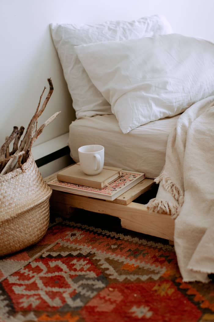 You can add some fire energy to your room with a geometric rug. Pointed shapes give off a yang vibe. Warm tones bring out the fire element.