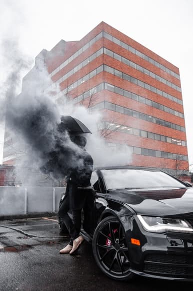The reason your car is emitting black smoke is because of a problem with the catalytic converter. The P0300 code means that there's been a voltage drop in the primary oxygen sensor circuit. What's happening is that the engine isn't getting enough oxy