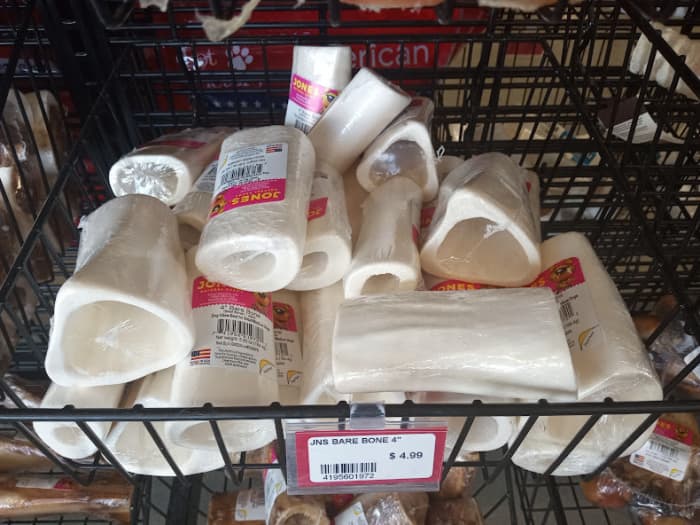 Many pet stores sell hollow beef bones. They cost a few dollars each and are well worth it since you can reuse them for months or even years.