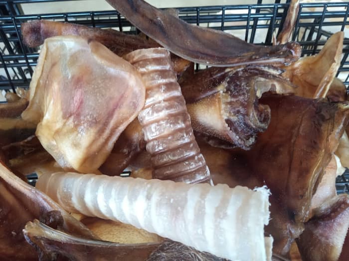 Dehydrated animal parts are generally well liked by canines but they don't last very long for harder chewers.