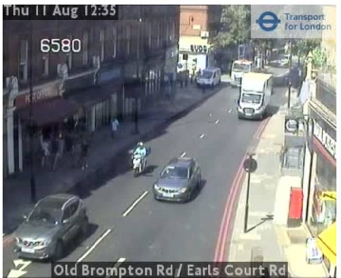 A live cam of my former home is the building above the shop on the left