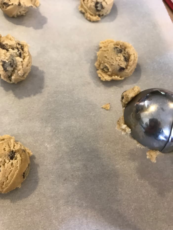 I place about 12 cookies on an average sized cookie sheet. They spread a bit, so give them enough room to spread. It also makes it easier to remove them from the baking sheet without messing them up - which makes them nicer!