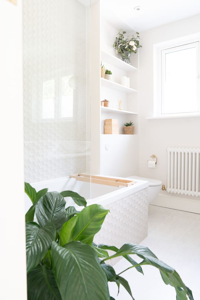 Keep adding pottery and rocks into a bathroom for earth feng shui. A shelf of these things will look nice.