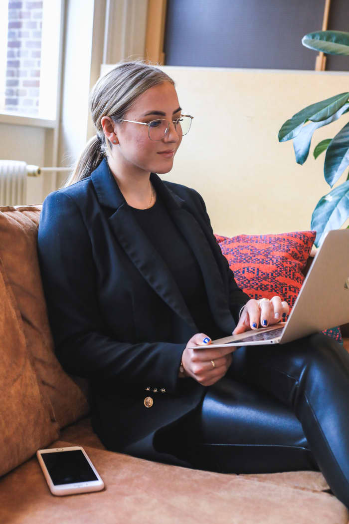 Simple preparations like an appropriate background and professional dress can go a long way in a virtual interview.