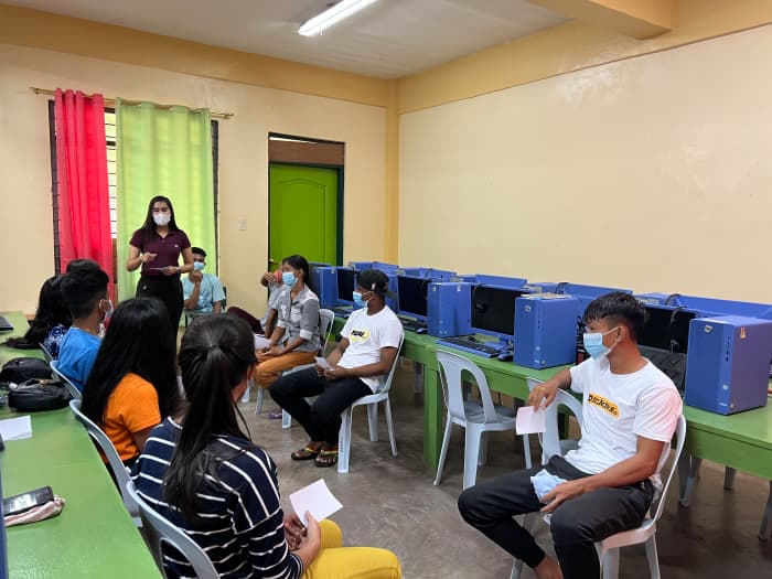 Ms. Anna Marie Abegael B. Loma, Teacher III, facilitates the second activity for Psychological First Aid for Grade 11 learners