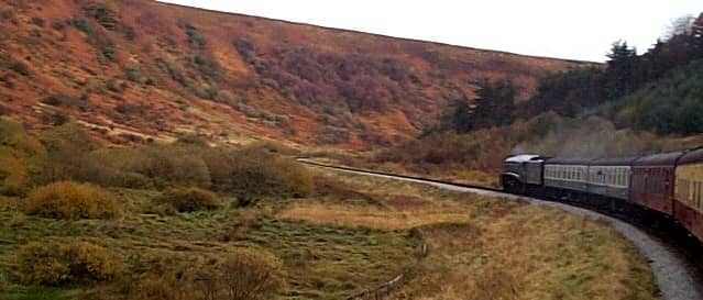 The North Yorkshire Moors Railway, with one of the preserved 'Streaks' (Gresley A4 Pacific) in Newtondale not far from Fylingdales
