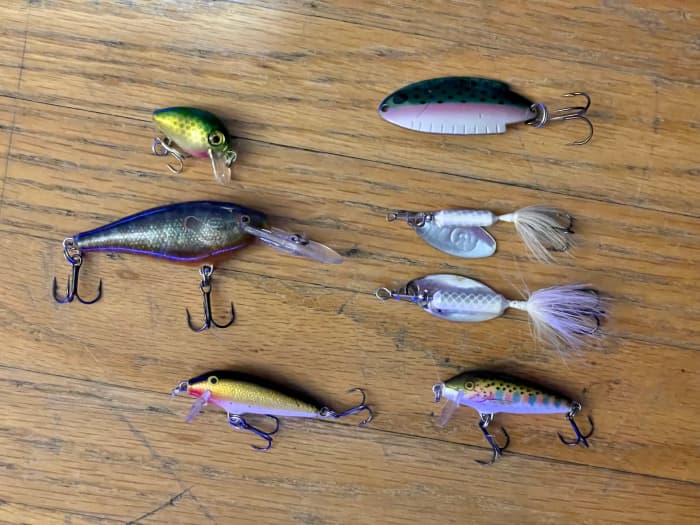 The three on the left are all versions of the Rapala Countdown lures. Top to bottom on the right are: Thomas 1/4oz Rainbow spoon, 1/8 and 1/6oz silver and white Rooster Tail, and another Rapala countdown