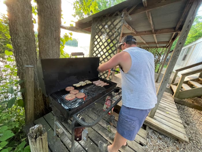 Cooking dinner after a long day on the water, the grill and patio of my cabin at His Place Resort is the perfect place to gather together.