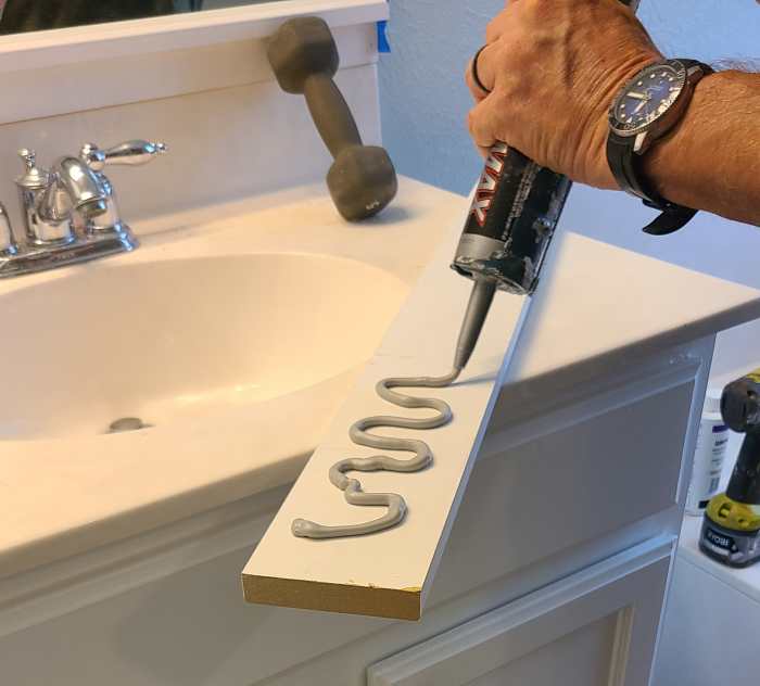 How to Frame a BuilderGrade Bathroom Mirror the Easy Way Dengarden