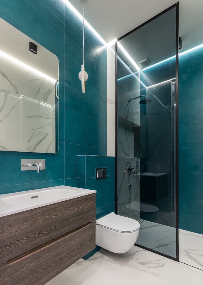 Your bathroom should be clean and have modern touches to it. The color of the walls is very popular right now.