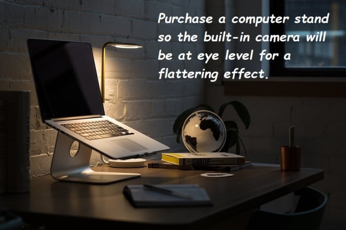 A computer stand is ideal for virtual meetings so the built-in camera is at eye-level for a flattering effect.