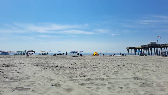 White sandy beaches with plenty of space for lounging and sunbathing abound in Ocean City, New Jersey.