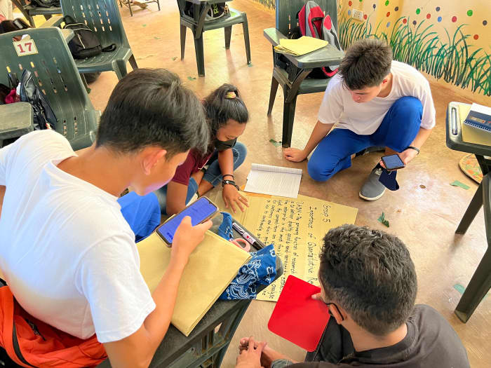 Grade 12-Garnet learners as they accomplish their collaborative learning activities in Practical Research 2